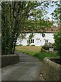 Across the bridge to Glebe farmhouse