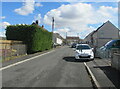 Hedge, houses and cars, Min-y-Rhos, Ystradgynlais