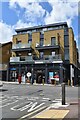 Modern flats and convenience store by Mottingham station