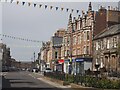 Dunbar High Street decorated with Flags