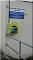 Defibrillator box on the wall of Little Mill Village Hall, Monmouthshire