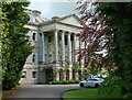 Amesbury Abbey, South facade, through trees