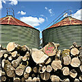 Logs and storage tanks at Manor Farm