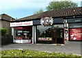 Shops at the corner of Main Street and South Mains Road