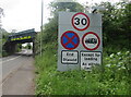 SO3102 : Signs on the approach to Little Mill, Monmouthshire by Jaggery
