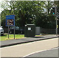 Dark green cabinet near an Ystradgynlais boundary sign