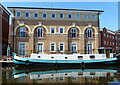 Barge moored at Armstrong House