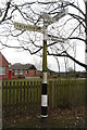 TL8918 : Direction Sign &#8211; Signpost outside the County Primary School in Messing cum Inworth by John V Nicholls