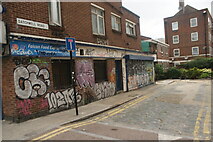 TQ3482 : View of street art on the side of Falcon Food Express on Satchwell Road from Bethnal Green Road by Robert Lamb