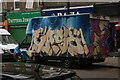 View of a van with street art on Bethnal Green Road