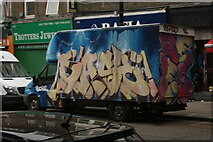 TQ3482 : View of a van with street art on Bethnal Green Road by Robert Lamb