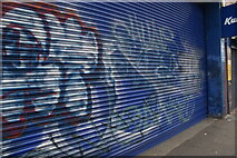 TQ3482 : View of shutter art on the front of Kwik Fit on Bethnal Green Road by Robert Lamb