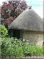 Small, thatched and round