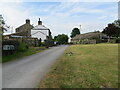 Track, grassed area and housing in Horton