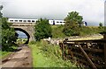 NY7307 : Settle-Carlisle Railway Bridge 190 over minor road by Luke Shaw