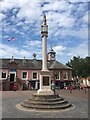 NY4055 : Old Central Cross in Carlisle market place by J Kelly