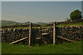 SK1179 : Limestone Wall with Stone Stile, Derbyshire by Andrew Tryon