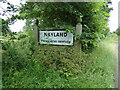 TL9834 : Nayland Village Name sign by Geographer