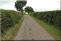 Footpath to Great Wolford along the Woodhils Farm drive