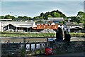 Cardigan: Commercial businesses situated on the opposite bank of the River Teifi