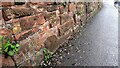 NY4154 : Stone wall on SW side of London Road at Chertsey Mount by Roger Templeman
