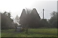 Long Lodge Oast House in mist