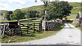 SD9073 : Gateway at junction of road to Litton and track to Sawyersgarth Cottage by Roger Templeman
