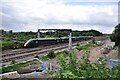 GWR class 802 train near Aristotle Lane footbridge