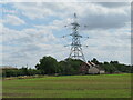 House and pylon south of Sheriff Hutton Bridge