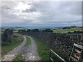 Lane descending hill, East of Rainow