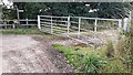 Field gateway and stile for footpath to River Eden at road bend