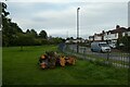 Logs beside Millfield Avenue