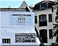 Fish bar signs overlooking the Cornwallis Street car park, Hastings