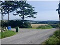 NH9251 : Road passing Braeside Farm by Richard Webb