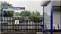NY8464 : Haydon Bridge Station carpark viewed through station platform fence by Luke Shaw