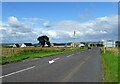 Looking down the B6309 to Glebe Farm