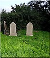 Two similar gravestones in Kingcoed, Monmouthshire