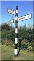 Cumberland County Council finger signpost on verge west of Wetheral Methodist Church