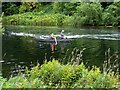 Fisherman and ghillie on the River Tweed