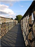 TQ2470 : Footbridge over the railway by Stefan Czapski