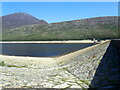 J3021 : The inward face of the Silent Valley Dam by Eric Jones