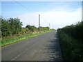 Straight section of road near Southfield Farm