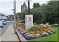 Flower beds and Covid posters, Galashiels