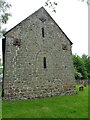 Gable end of the stone chancel at St James