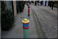 View of brightly coloured bollards on Floral Street #8