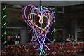 View of heart-shaped neon lights in Covent Garden Piazza