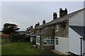 NU2328 : Row of Cottages in Beadnell by Chris Heaton