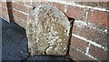 Carleton face of Carleton/Harraby boundary stone on NE side of London Road