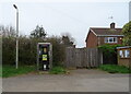 Defibrillator in telephone kiosk on Main Street, North Kyme