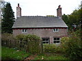 SJ7823 : Cottage adjacent to the church in Norbury, Staffordshire by Jeremy Bolwell